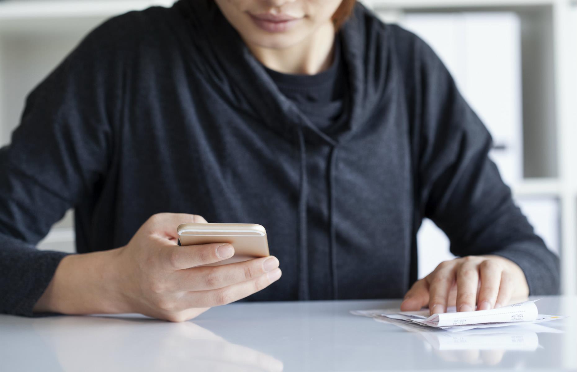 Woman mobile phone bill